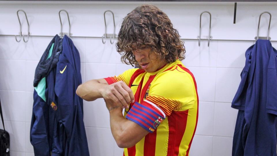 Carles Puyol with the captain's armband
